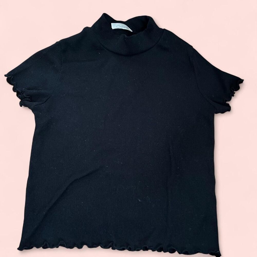 Black mock neck top with lettuce hem